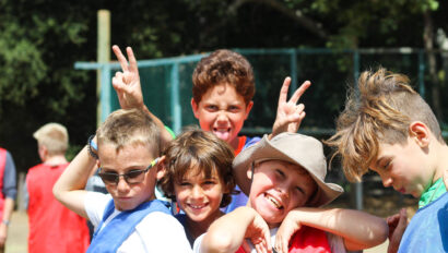 group of boys making silly faces and posing for the camera.